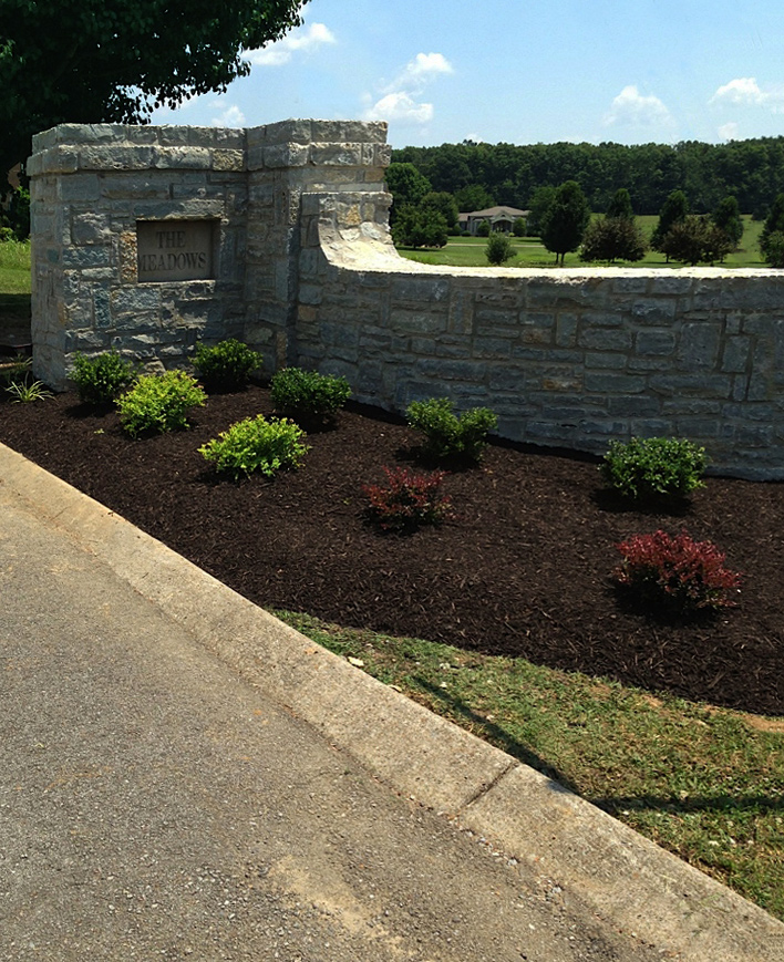 The Meadows' stone wall entrance completion